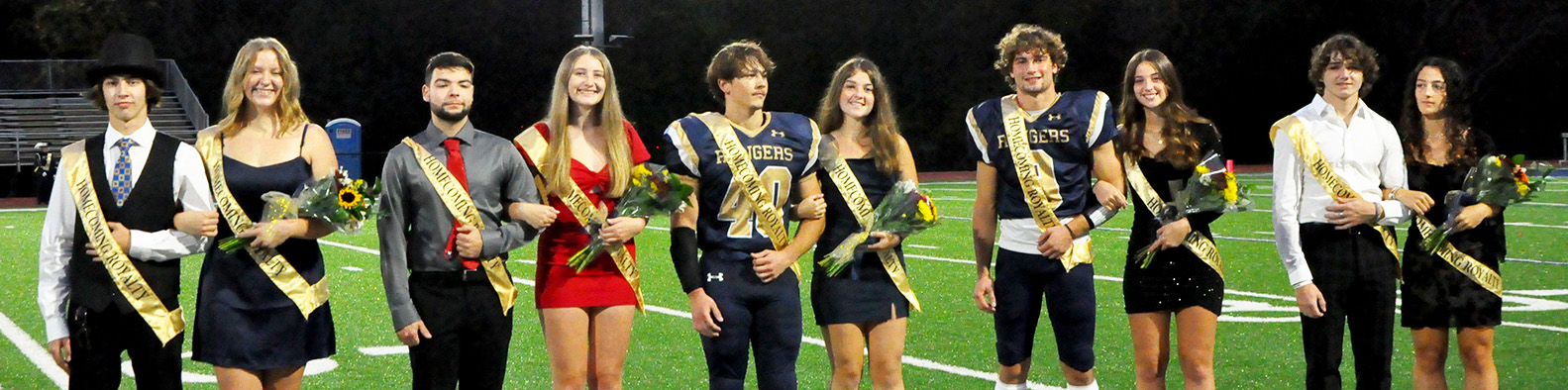 Homecoming Court on the football field